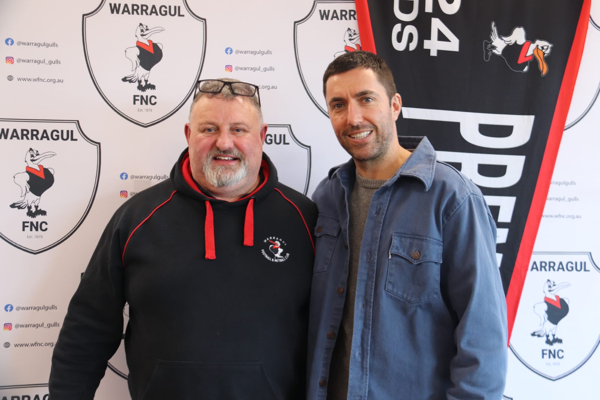 Warragul Football Netball Club sponsorship officer Troy Notman with former Carlton champion Kade Simpson.