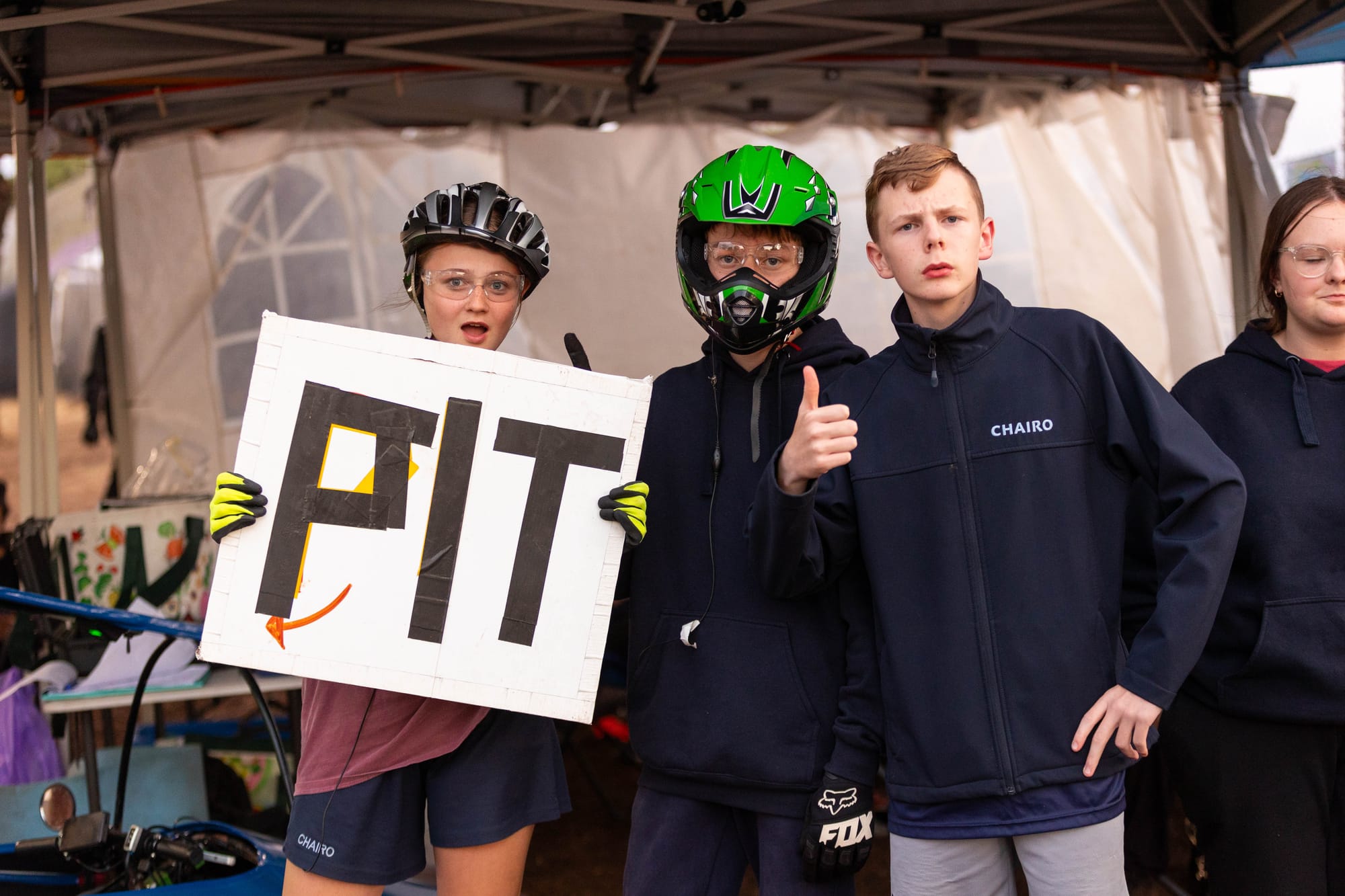 Ready for a pit change and their turns behind the wheels during the 24 hours of in the Energy Breakthrough competition were Chairo students, from left, Charlotte Smith, Spencer Stephens and Spencer Bryant.