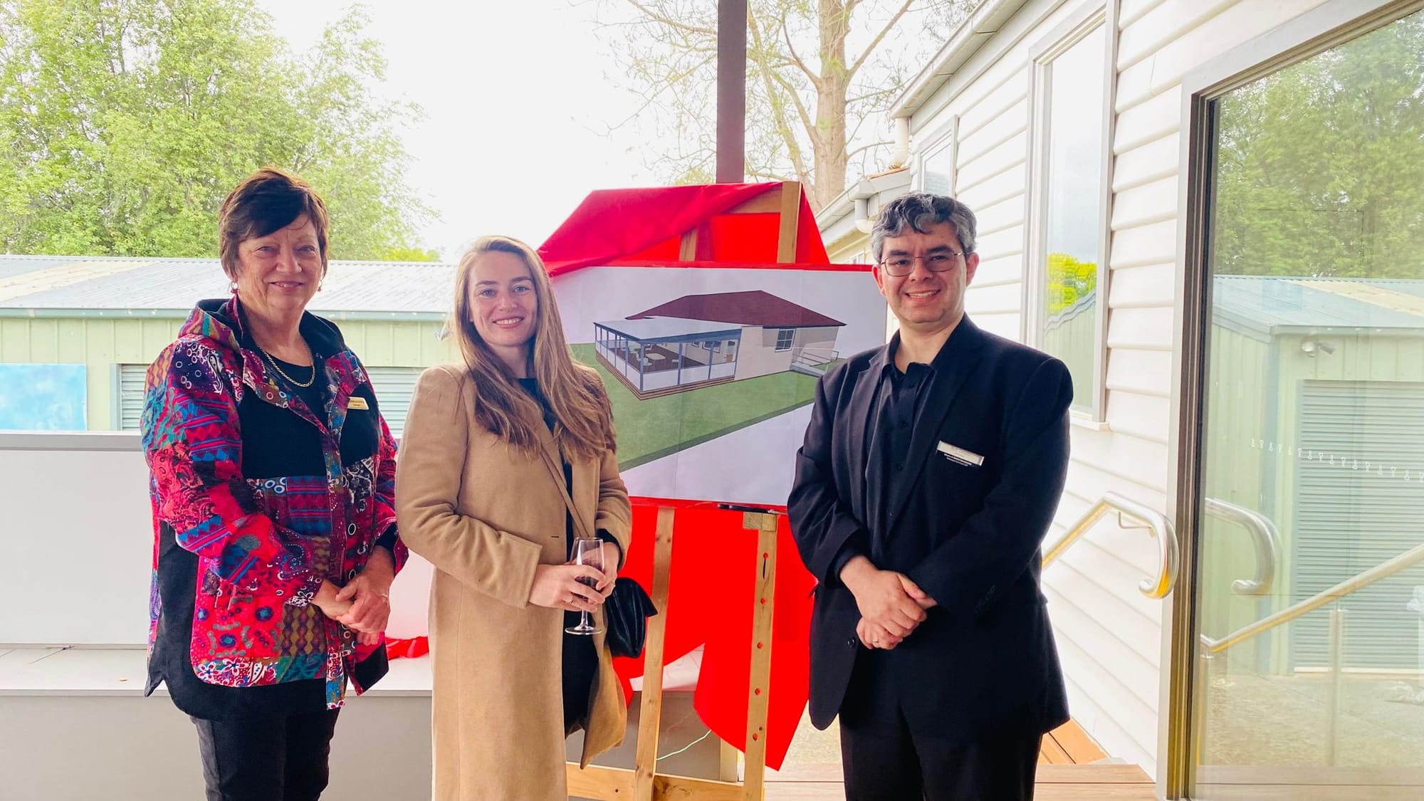 At the official opening of the new d3eck at Warragul Community House were manager Rosemary Allica, chairperson Jessica O'Donnell and Drouin and District Community Bendigo Bank Rob Celeda.