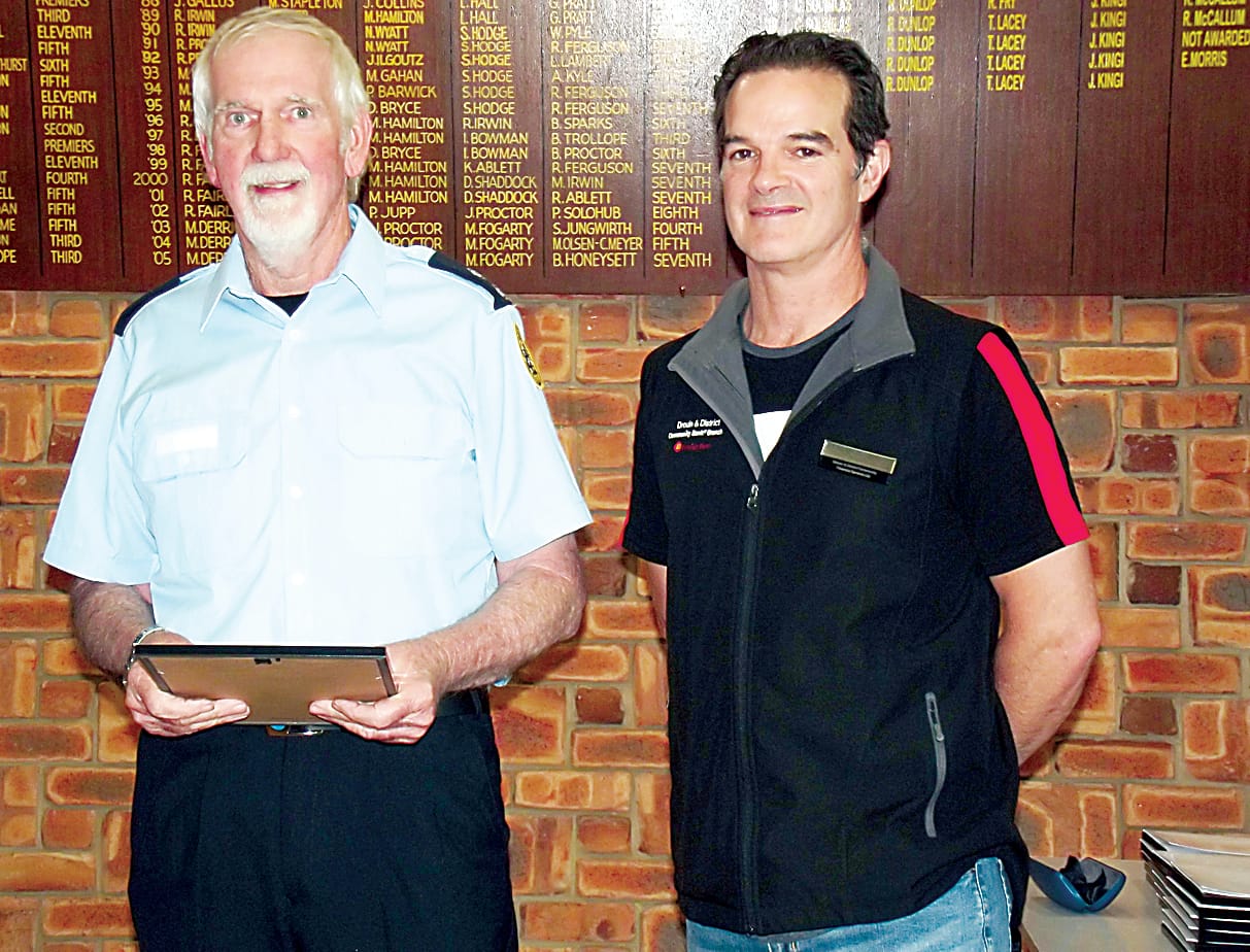 The Warragul-Drouin SES unit will replace some obsolete equipment after member Peter Lennox (left) accepts funding from Drouin bank vice-chair Matthew Williamson.