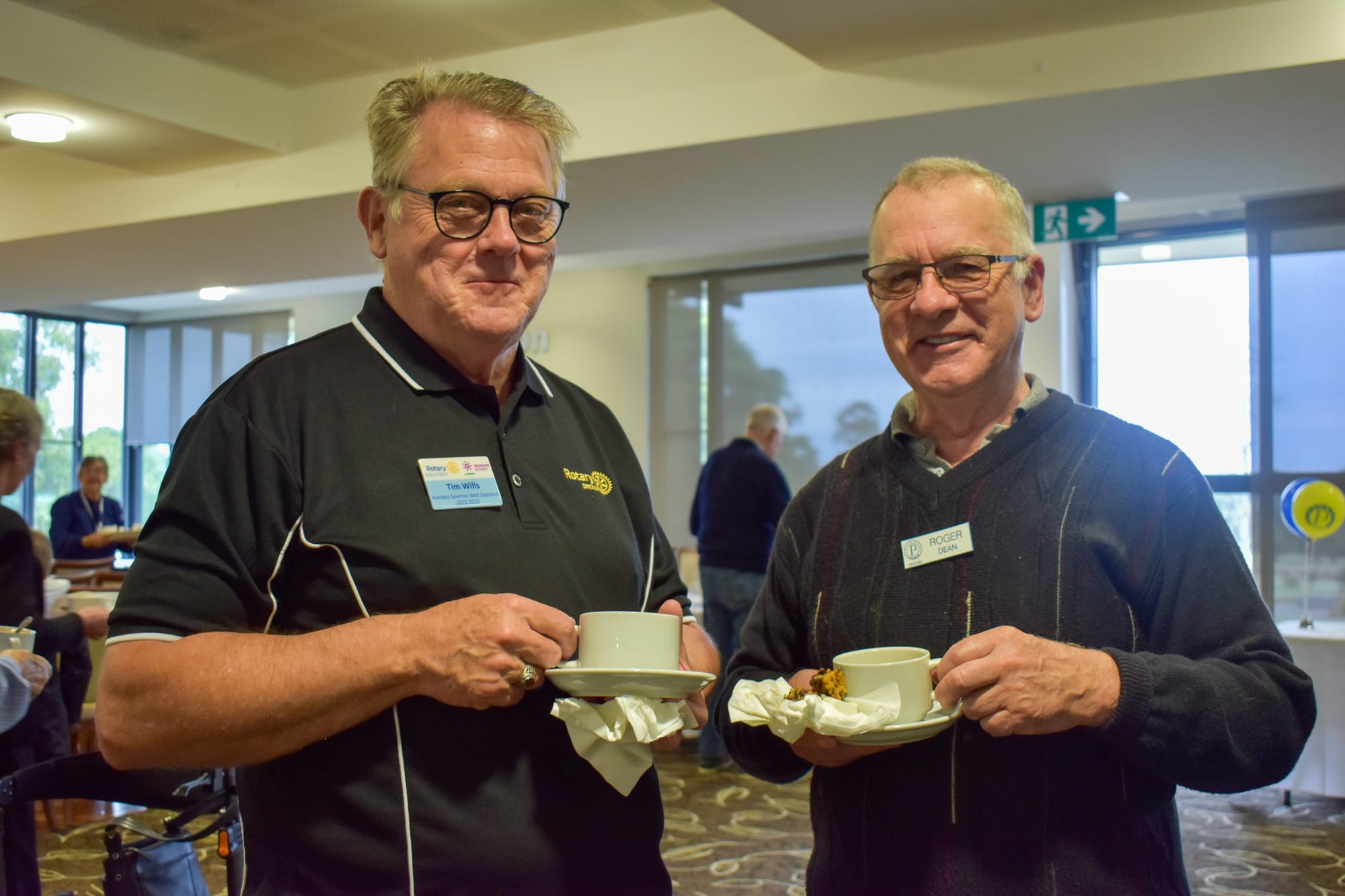 Tim Wills and Roger Dean enjoy the morning tea.