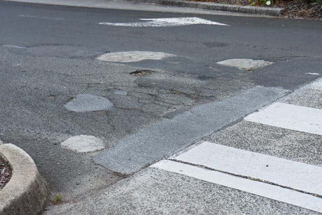 Pot Holes Woolies Carpark - 10.02.2022