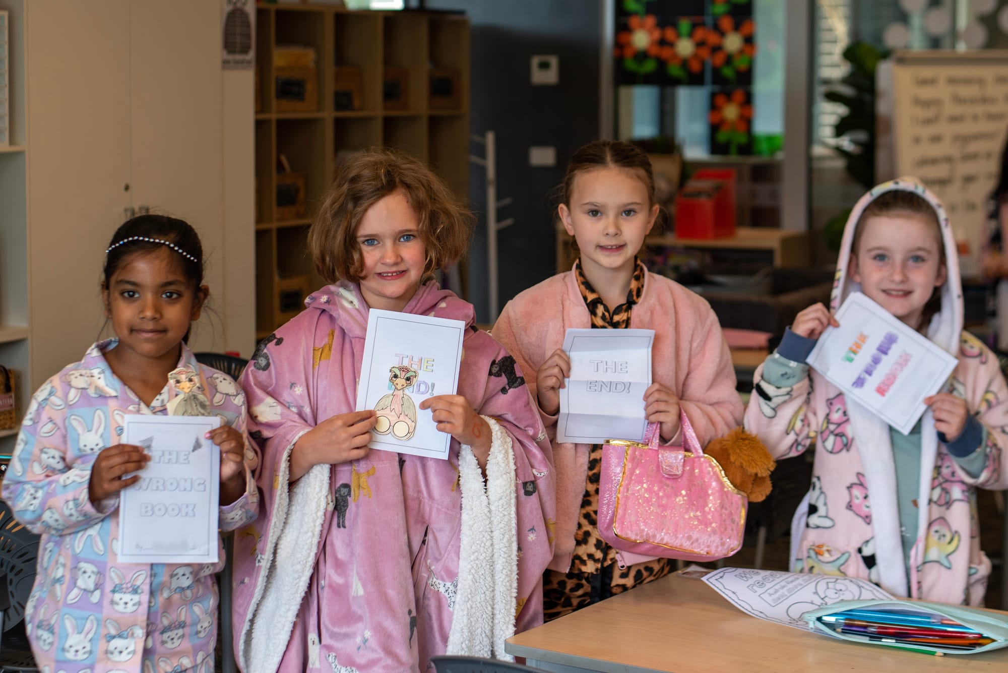 Seyara Ukwattha Liyanage, Ivy Reynolds, Heidi McCann and Katherine Goode with their mini-book activity.