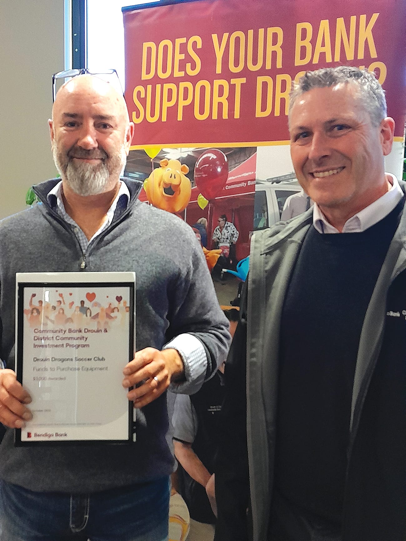 Drouin Dragons Soccer Club president Jason Beer with director Andrew Waller.