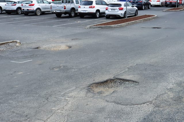 Pot Holes Woolies Carpark - 10.02.2022