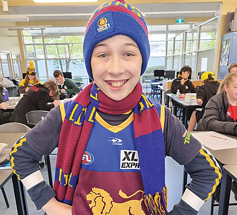 Tristan Bernthal proudly shows his support for the Brisbane Lions.