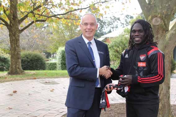 Chairo’s Essendon star presents jumper