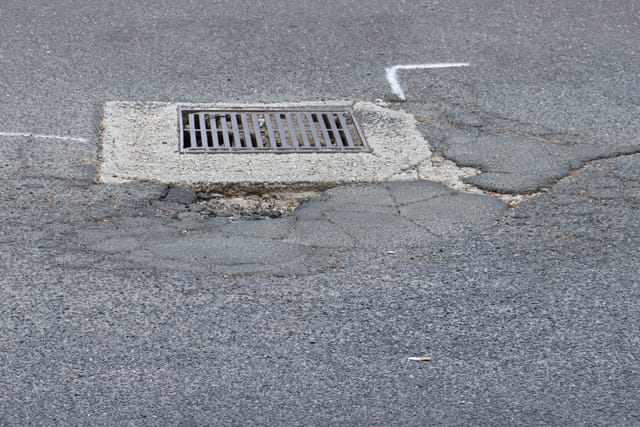 Pot Holes Woolies Carpark - 10.02.2022