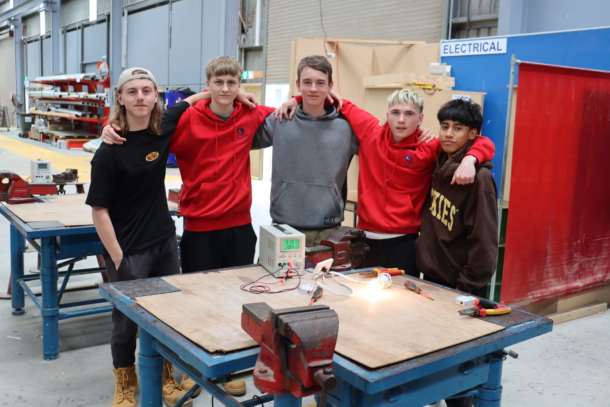 Budding electrical students from Warragul Regional College, Bailen Liewen, Cooper Crowe, Jack Monson, Lockie Budd and Jason Ceron working on an electrical circuity at the Baw Baw Skills Centre.