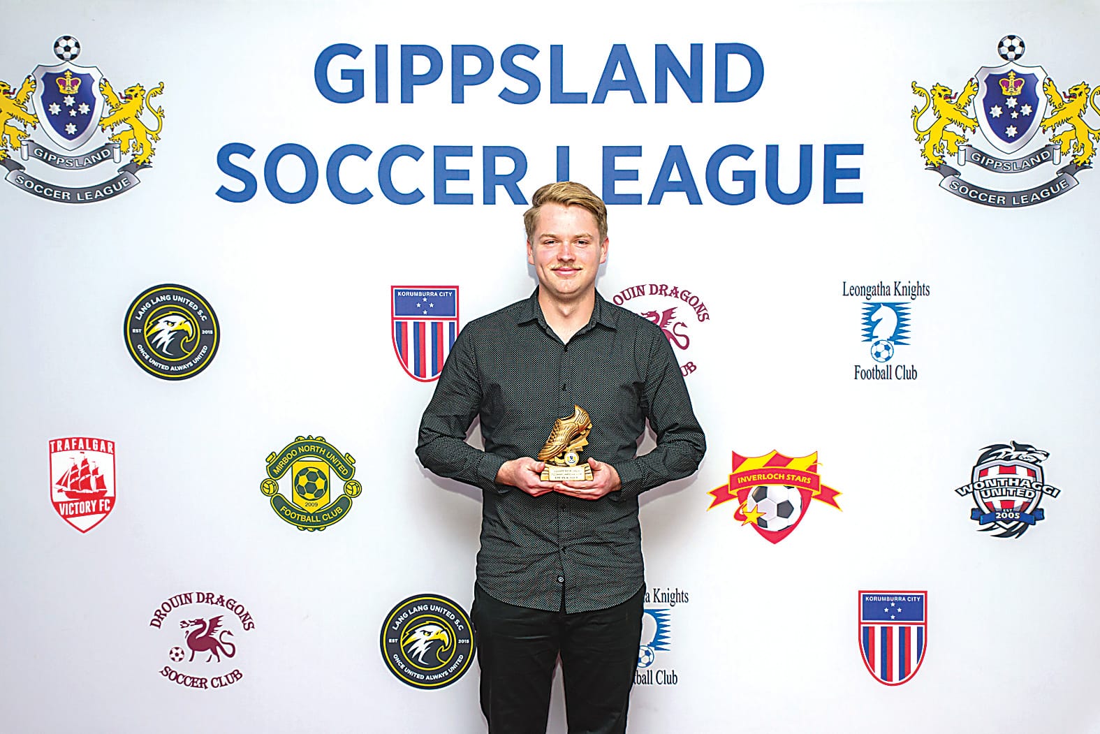 Trafalgar Victory's Logan Winter receives the golden boot award for leading goalscorer in the senior men's competition.Photographs courtesy of Morgan Fisher Photography.