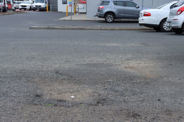 Pot Holes Woolies Carpark - 10.02.2022