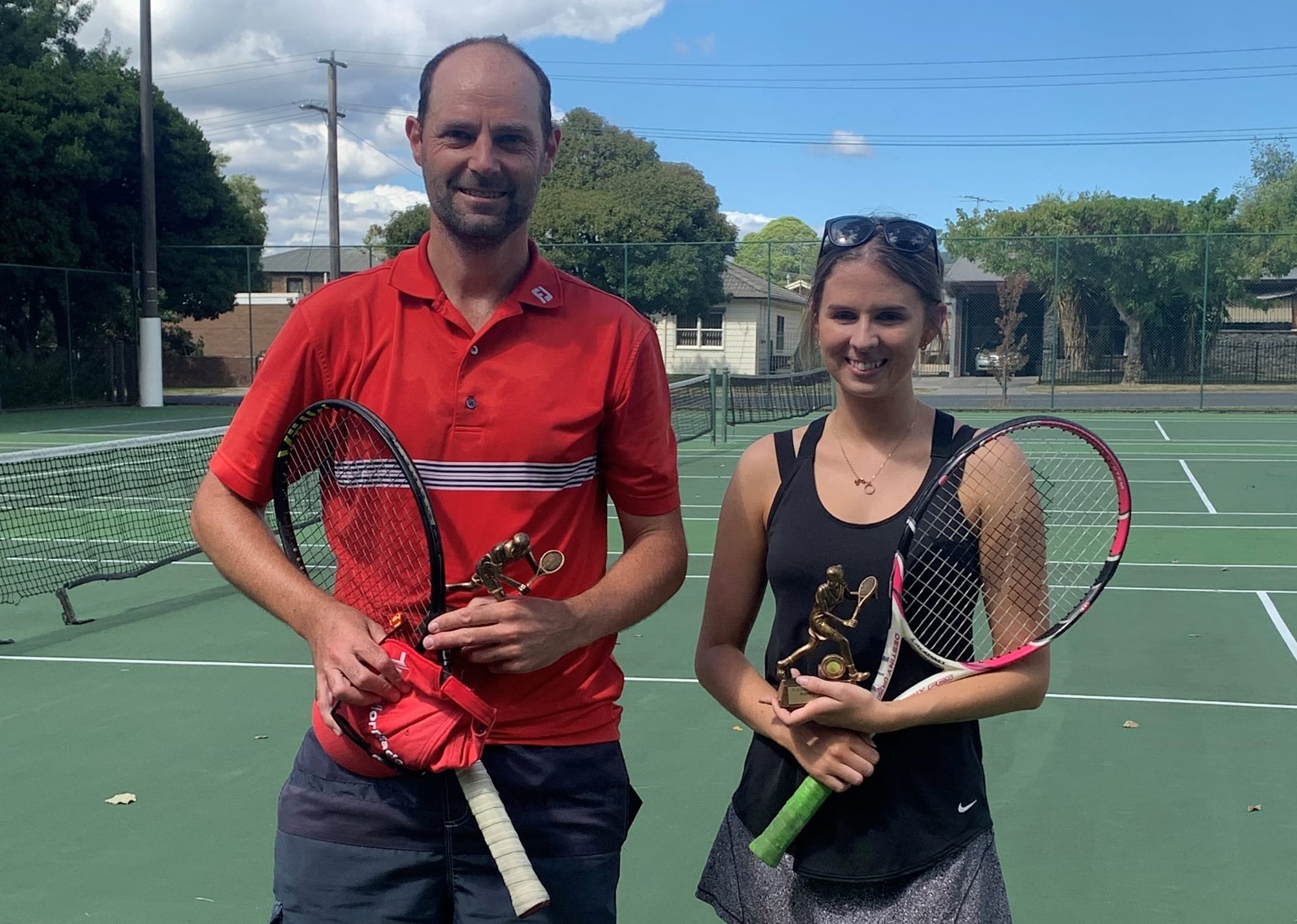 Traf crowns tennis champions