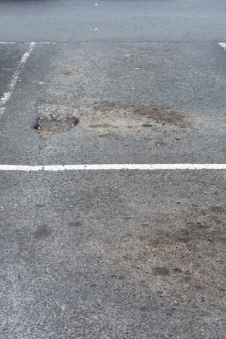 Pot Holes Woolies Carpark - 10.02.2022