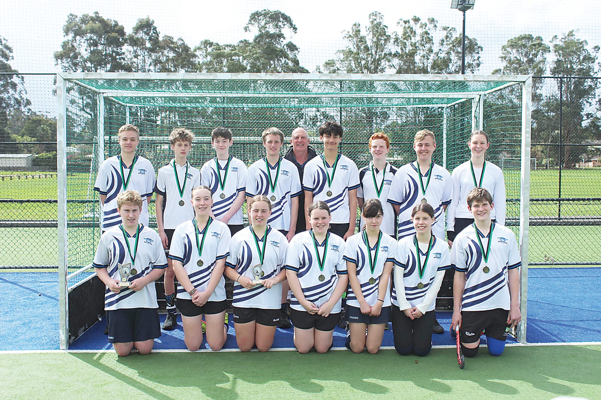 Warriors came out on top in the under 15s. Their winning side is (back, from left) Josh Pepper, Zephaniah Marriott, Harlan Thomson, Lachlan Buchanan, Andrew Marks (coach), Avishai Gounder, Sam Pepper, Judah Mihail, Liv West, (front, from left) Zach Coster, Zali Gordon, Emily Coster, Elizabeth Buckley, Elizabeth Keen, Alexis Hazell and Levi Armstrong.