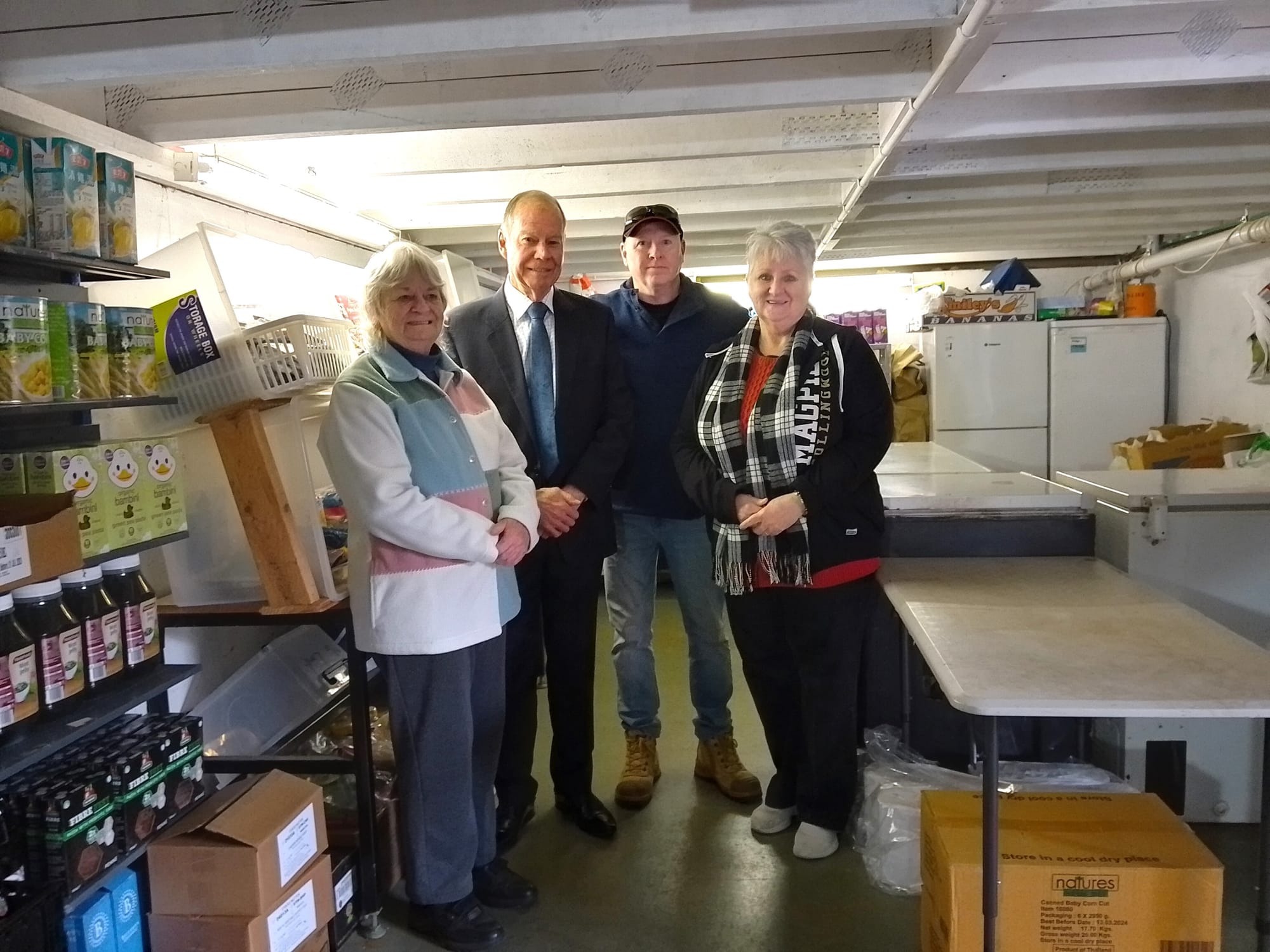 Giving a tour of Food Relief Neerim District's cramped premises under the stage of the local hall to Member for Monash Russell Broadbent (second from left) are Food Relief's Judy Gleeson (left), Community Bank board member Bruce MacDougall and Food Relief's Sue Richardson.