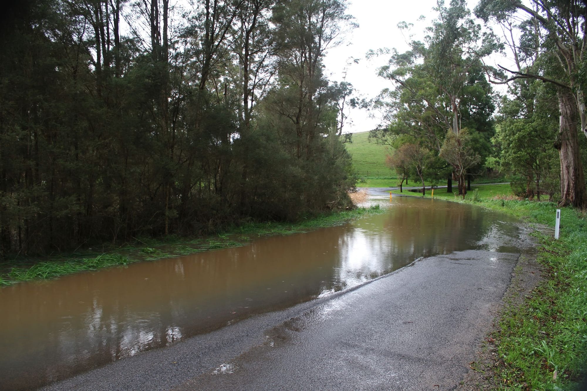 Flood waters close roads