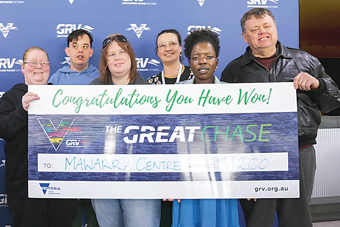 First place winners from Mawarra Centre, Claire, Matthew, Kaitlyn, Jacob, Tempany, Jo, Tina and Russell celebrate with their giant cheque.