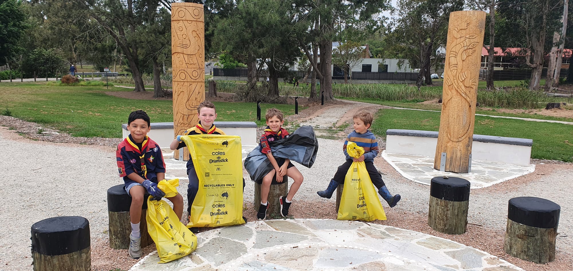 Joey scouts Luke Frost, Edward Miles (cub scout), Nate Healey and Clayton Kohn with their bags of rubbish for Clean-up Australia Day.