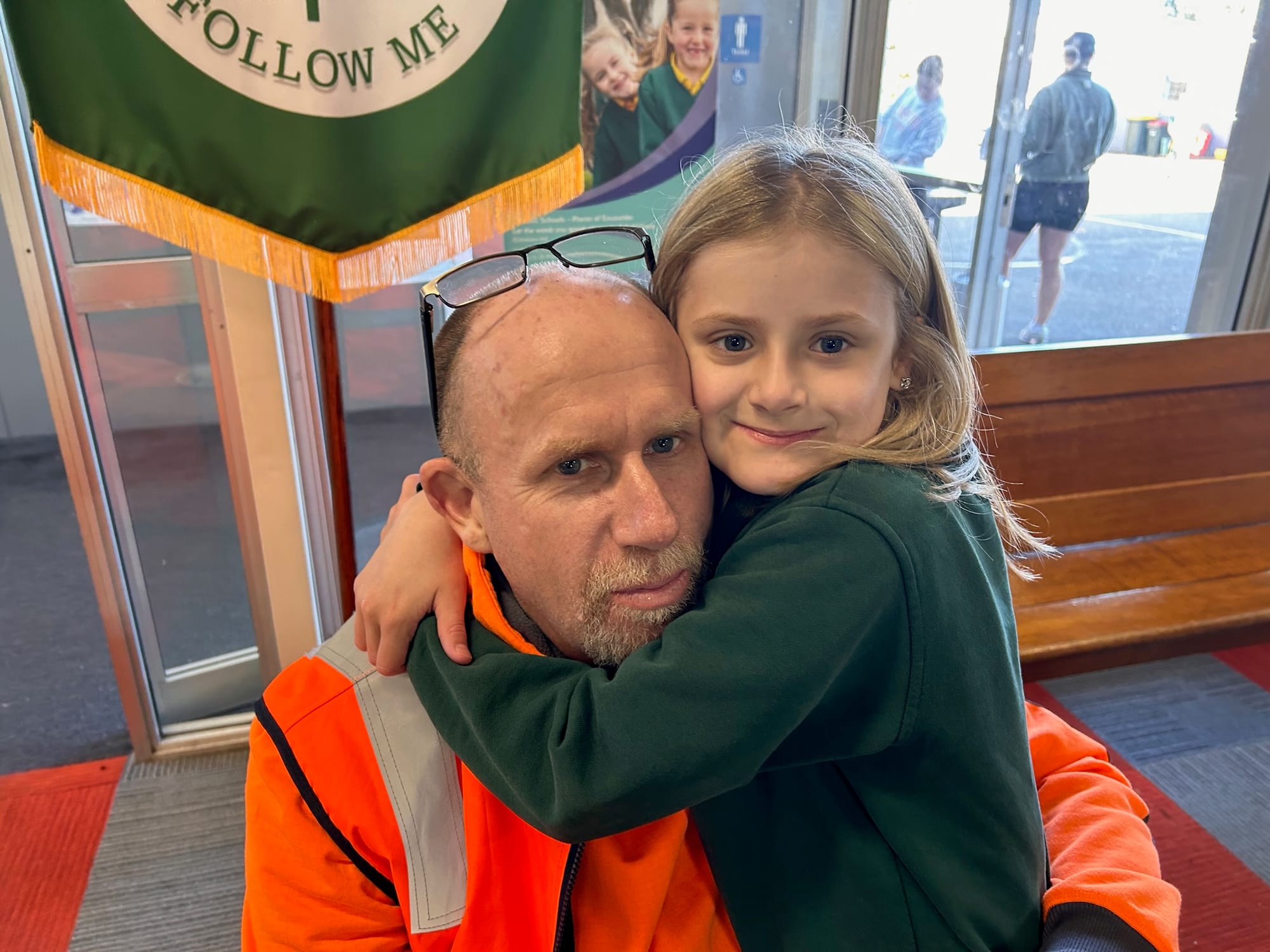 Ivy Kidd gives her dad Darren a big hug for father's day.