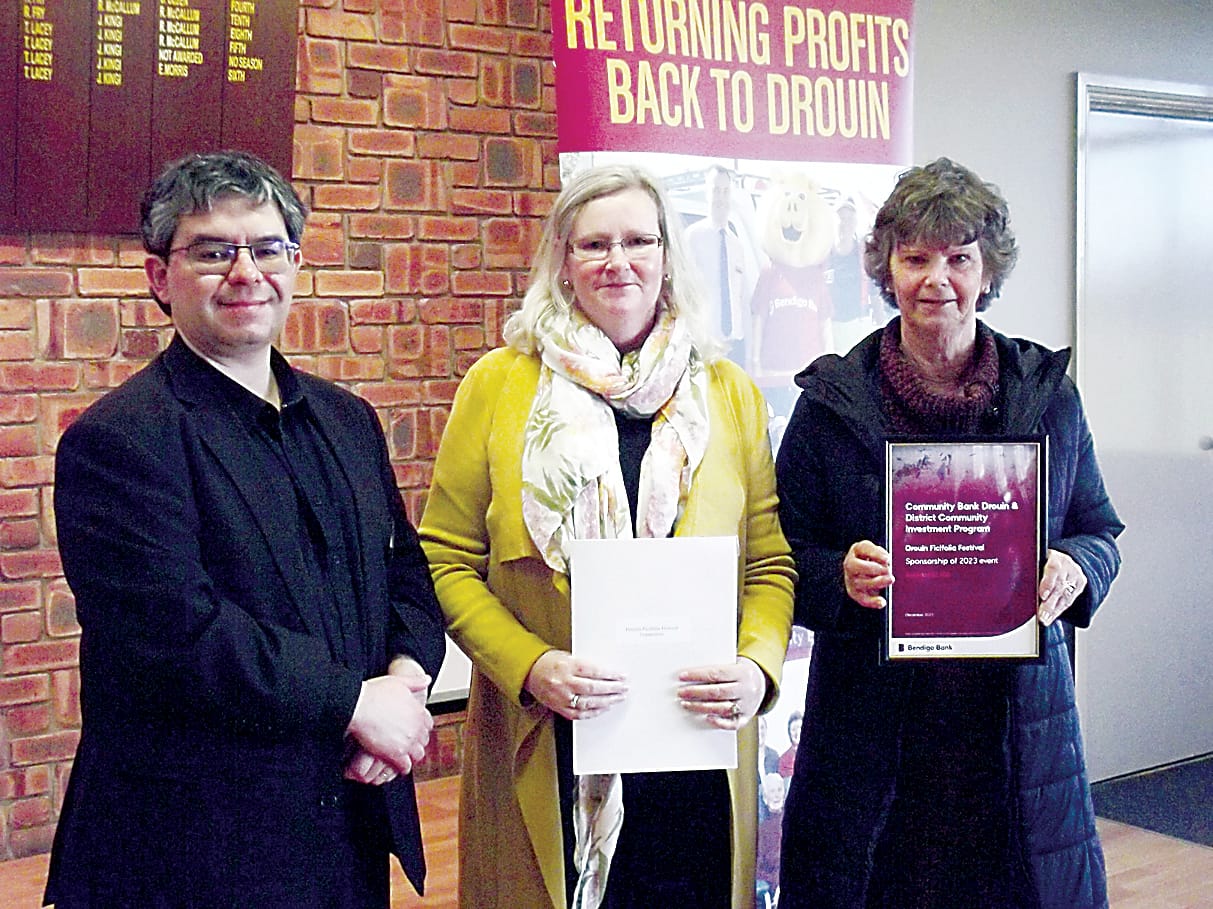 Above: Drouin's Ficifolia Festival representatives Gail DaBinnett (centre) and Anne Stalker express their thanks to bank director Rob Celada.Right: Bank vice-chair Matthew Williamson (centre) presents funding to stage a Lions district convention to Ian de Bruyne (left) and Ian Ingliss.