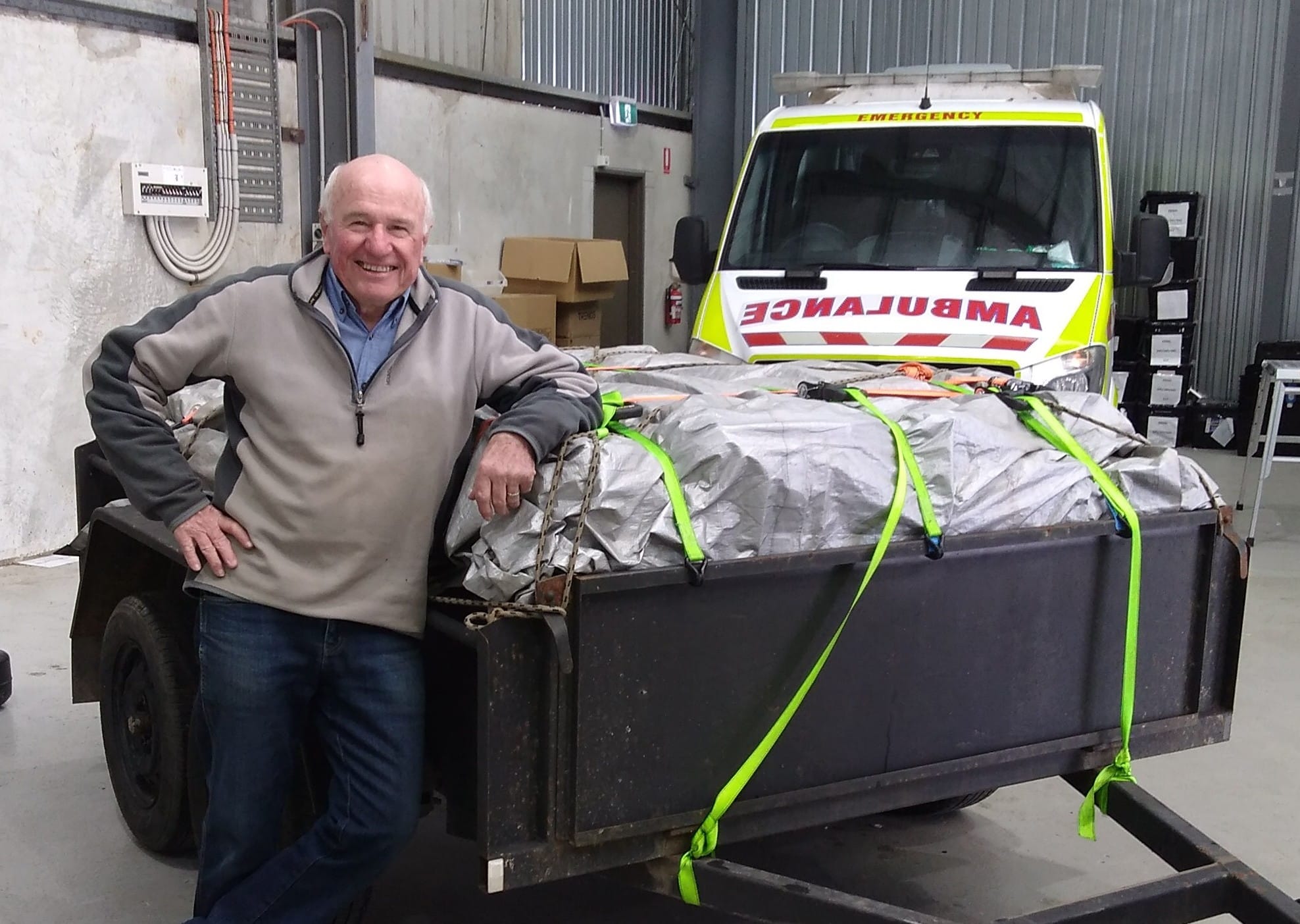 Ex-Ambulance Victoria uniforms go north to help out