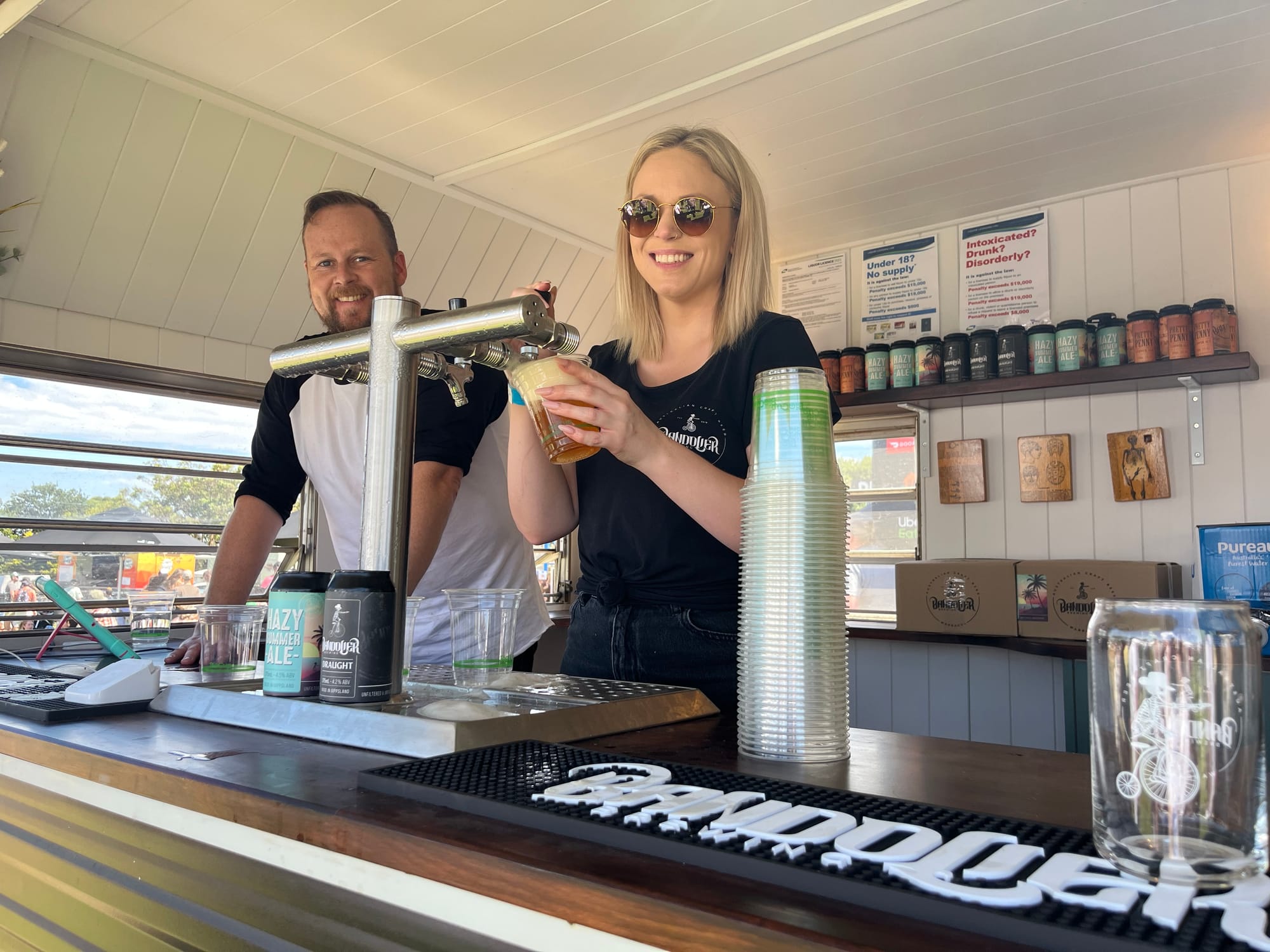 Owner of Bandolier Brewing Xander Thompson operations manager Amber Giblin were busy serving customers all day.