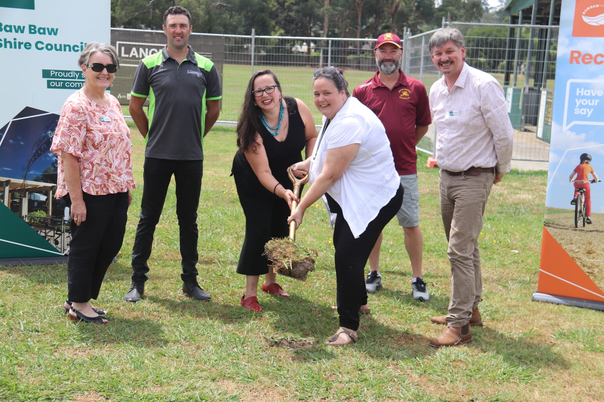 At a turning of the sod for redevelopment of Bellbird Park in February 2022 are (from left) Baw Baw Shire councillor Annemarie McCabe, Langden Constructions representative Tim Birch, Member for Eastern Victoria Harriet Shing, WGHA representative Stephanie Gourley, Drouin Dragons president Jason Beer and mayor Michael Leaney.