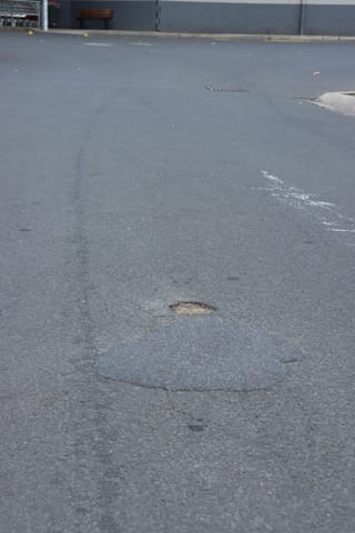 Pot Holes Woolies Carpark - 10.02.2022