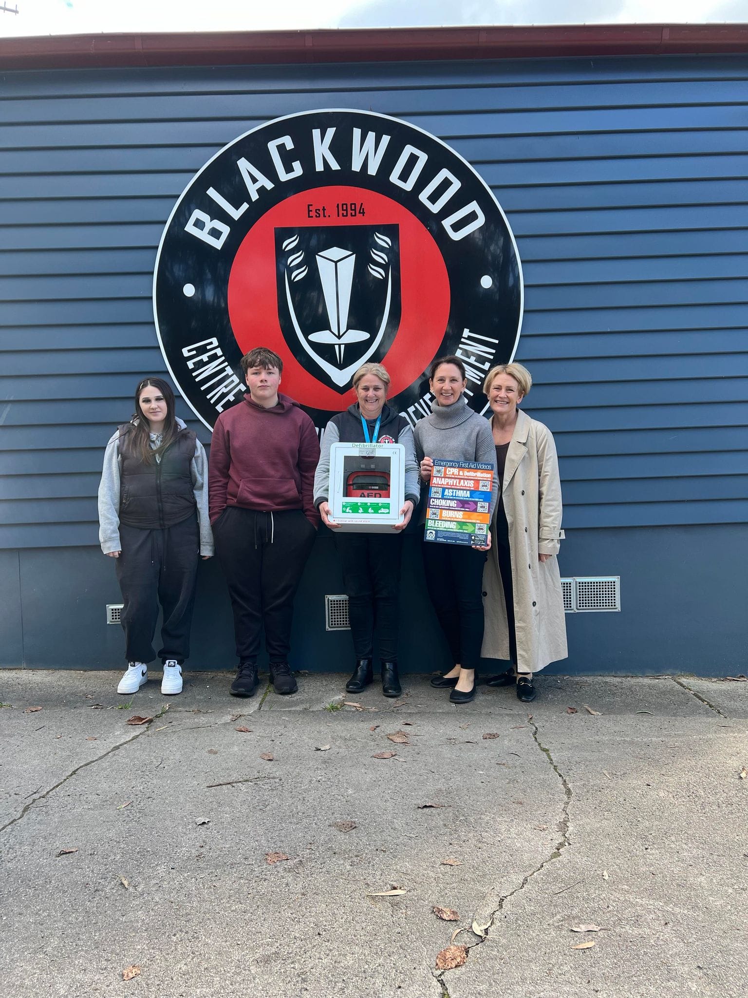 Labertouche Primary School now has a defibrillator.  Pictured at the presentation are A Girls' Day Out committee member Margie Whitford, Rorie, Matilda, Lachlan and principal Christie Bransgrove.