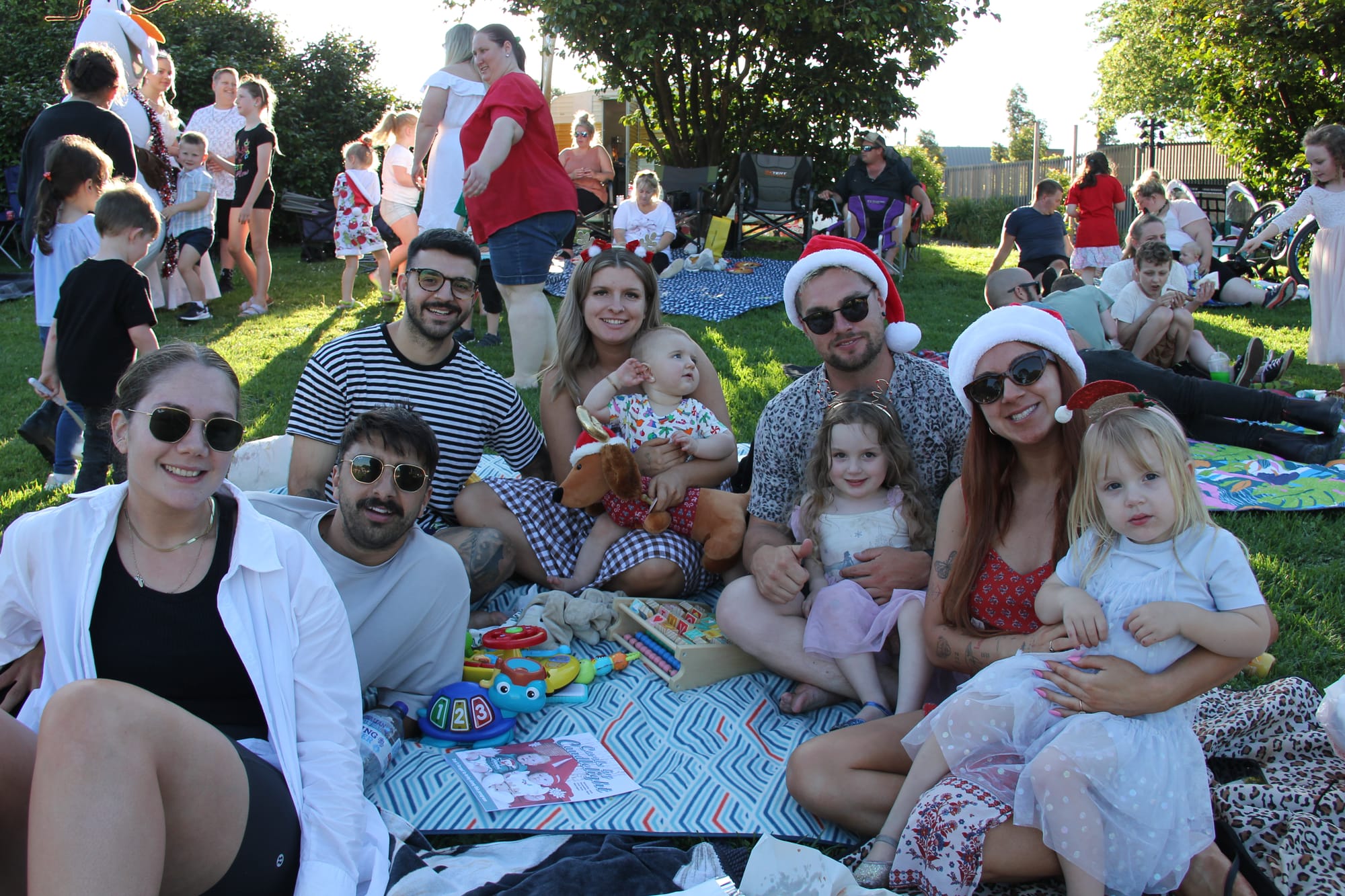 DECEMBER: Enjoying the Warragul carols in Civic Park are (from left) Rachel Nash, Brendan Salce, Rick Salce, Sam Interlandi, Kori Salce, Hayden Despetovich, Zahli Despetovich, Brianna Salce and Alaska Despetovich.