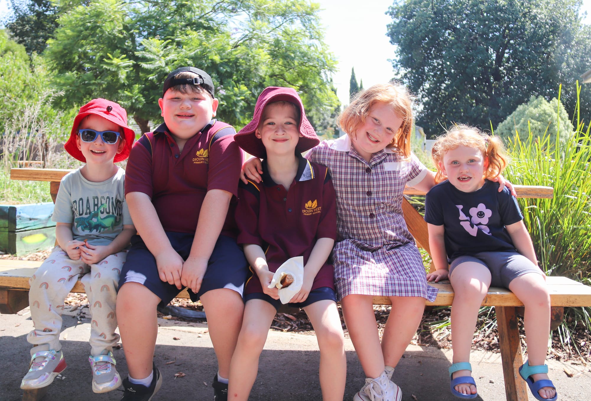 Showing off their big smiles on the sunny afternoon are (left to right) Dante Burgess, Caleb Tindle, Silas Burgess, Amelie Tindle and Aubrey Tindle.
