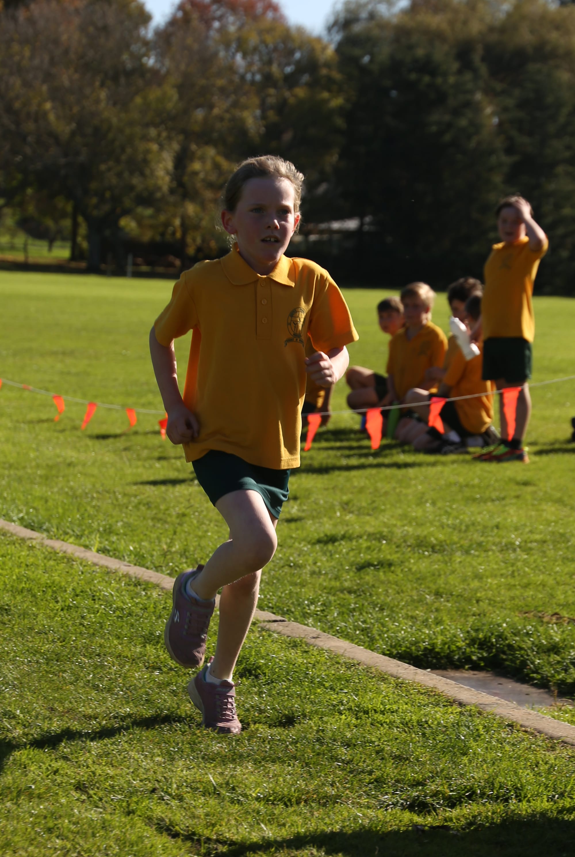 Sinead Juster wins the St Joseph's Primary School cross country race at Geoff Watt Track.