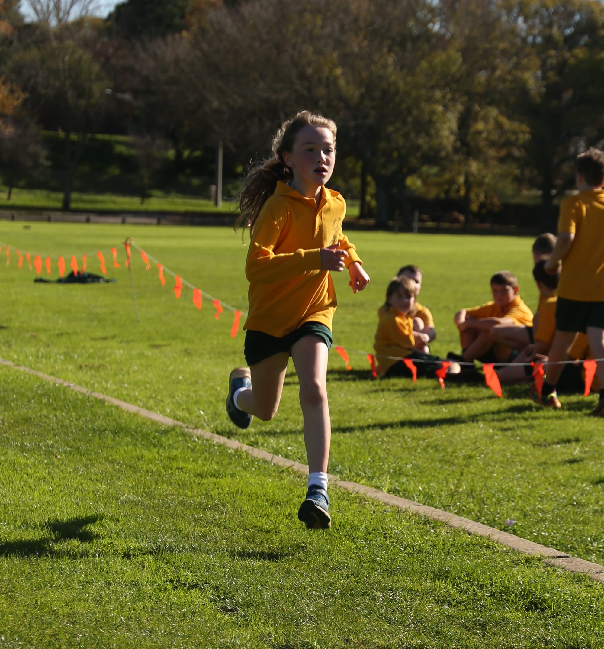 Morgan completes the 2km cross country race at Geoff Watt Track.