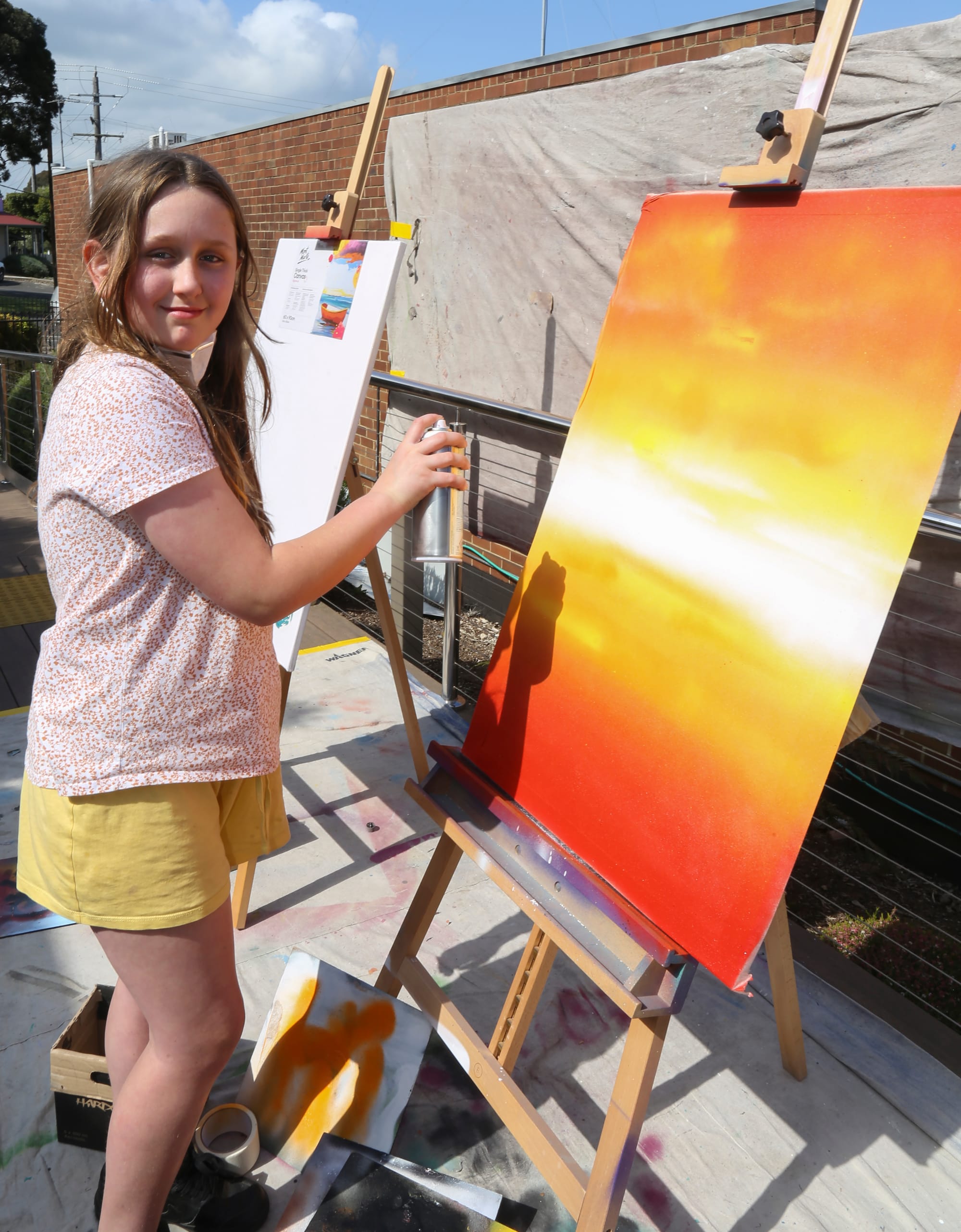 Orange and yellow hues are brought to life by Paris Wagstaff.