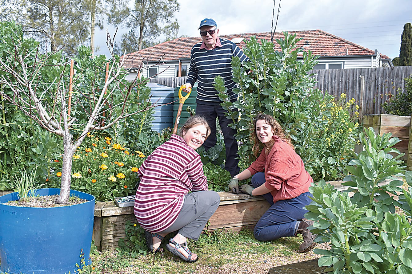 Georgia Mitchell, Ralph Slaughter and Zoe Clarke get to work on the garden.