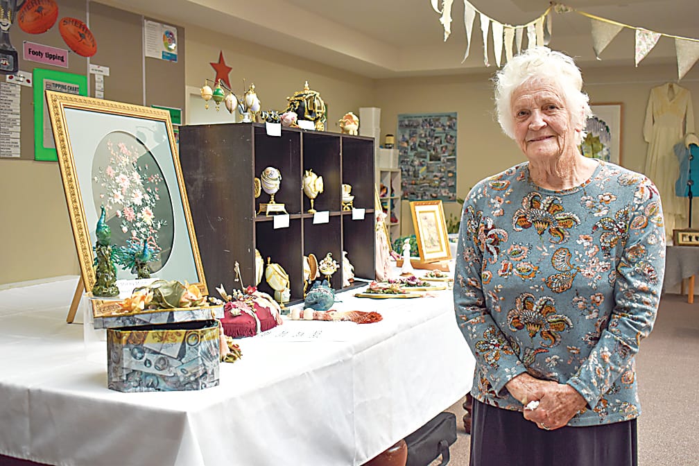 Shirley Stone proudly shows off her large number of projects.