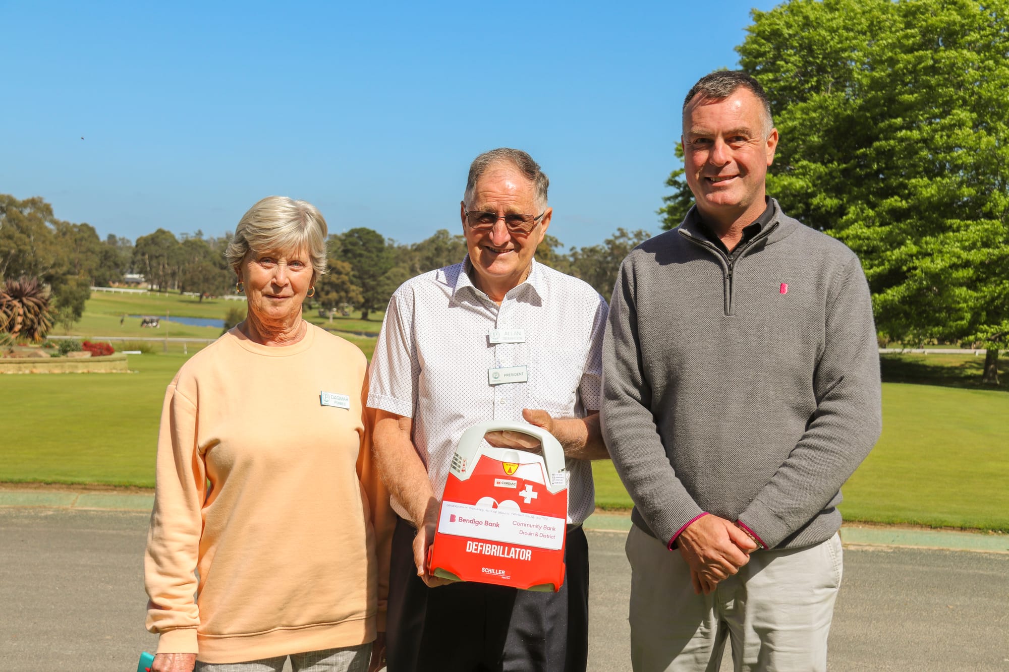 Bank provides new defibrillator for club