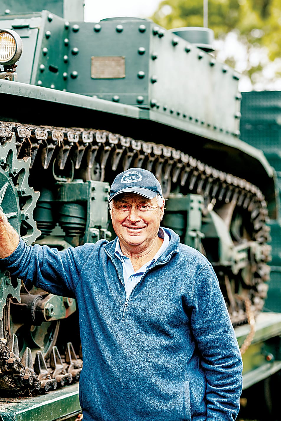 Peter Tack with a tank, one of the more unique vehicles on display.