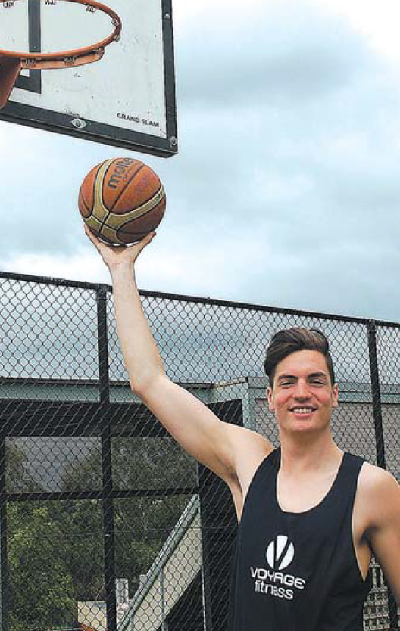 Tall Tim trains for basketball