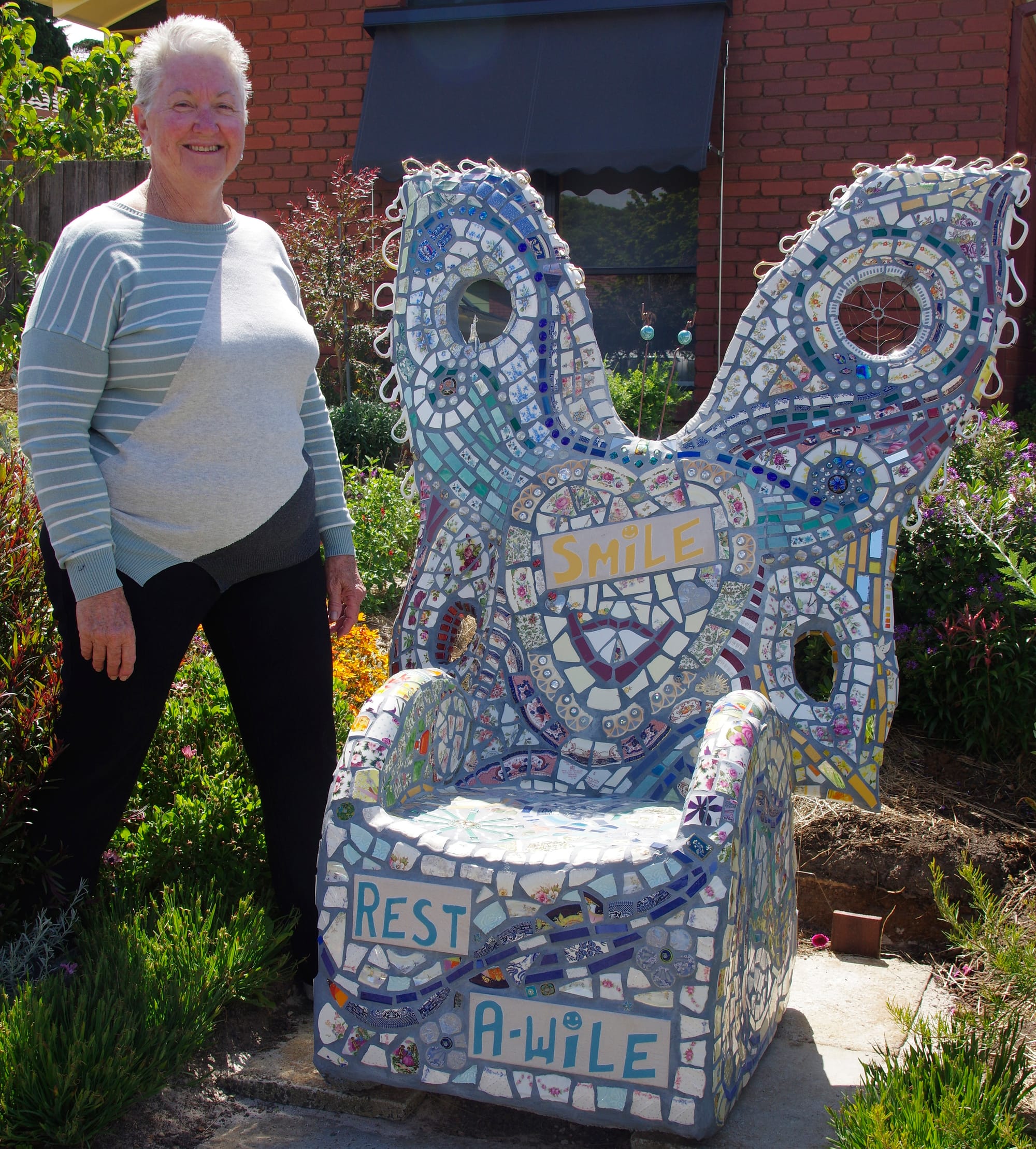 Aluminium chair transformed into mosaic butterfly