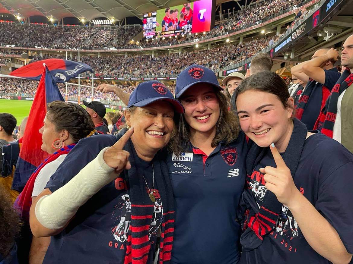 Jodie cheers on beloved Dees to AFL premiership in Perth
