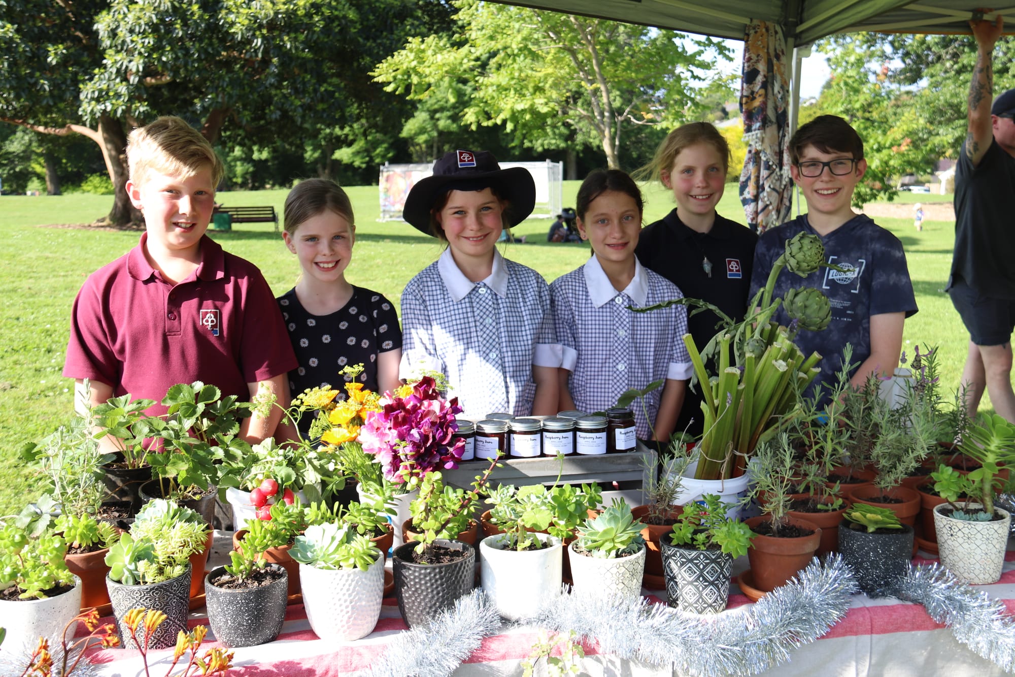 St Paul's Anglican Grammar School students were kept busy on their plant stall (from left)Charlie Brewer, Rose Oldham, Grace Tawse, Allira Davidson, Savannah McNaught and Lachlan McNaught.
