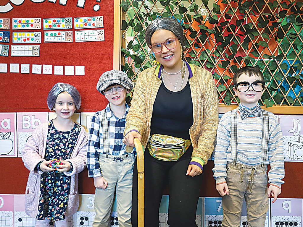 Above: Glam-ma Maddie Wood with her old friends Chelsea Goode, Eric Tweedie and Oliver Morton.Right: Sporting rollers and walking sticks are Posie Creighton and Thomas Dickinson.