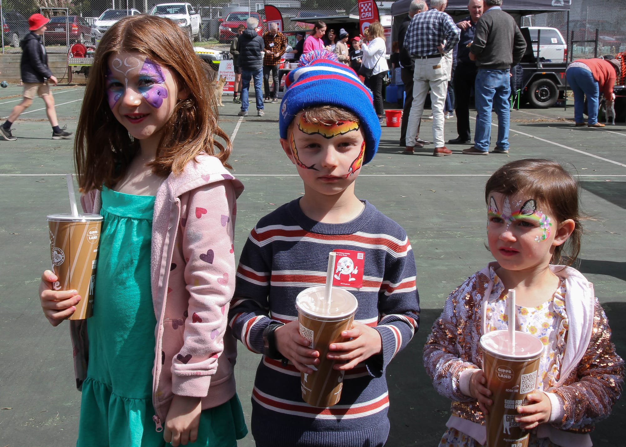 Emma, William and Lucy Gunn of Seaview enjoy their milkshakes.