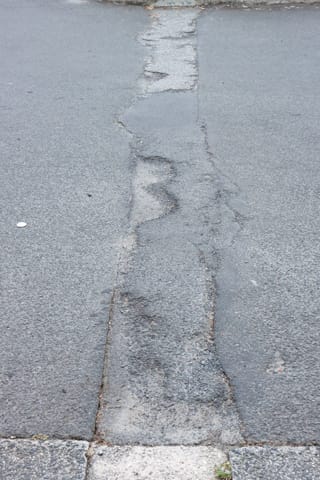 Pot Holes Woolies Carpark - 10.02.2022