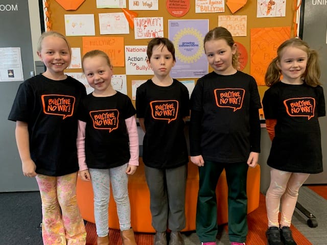 One of the school parents made t-shirts to spread the stop bullying message.  Proudly wearing their t-shirts are (from left) Pippa, Sophie, Nyah, Sienna and Addi.