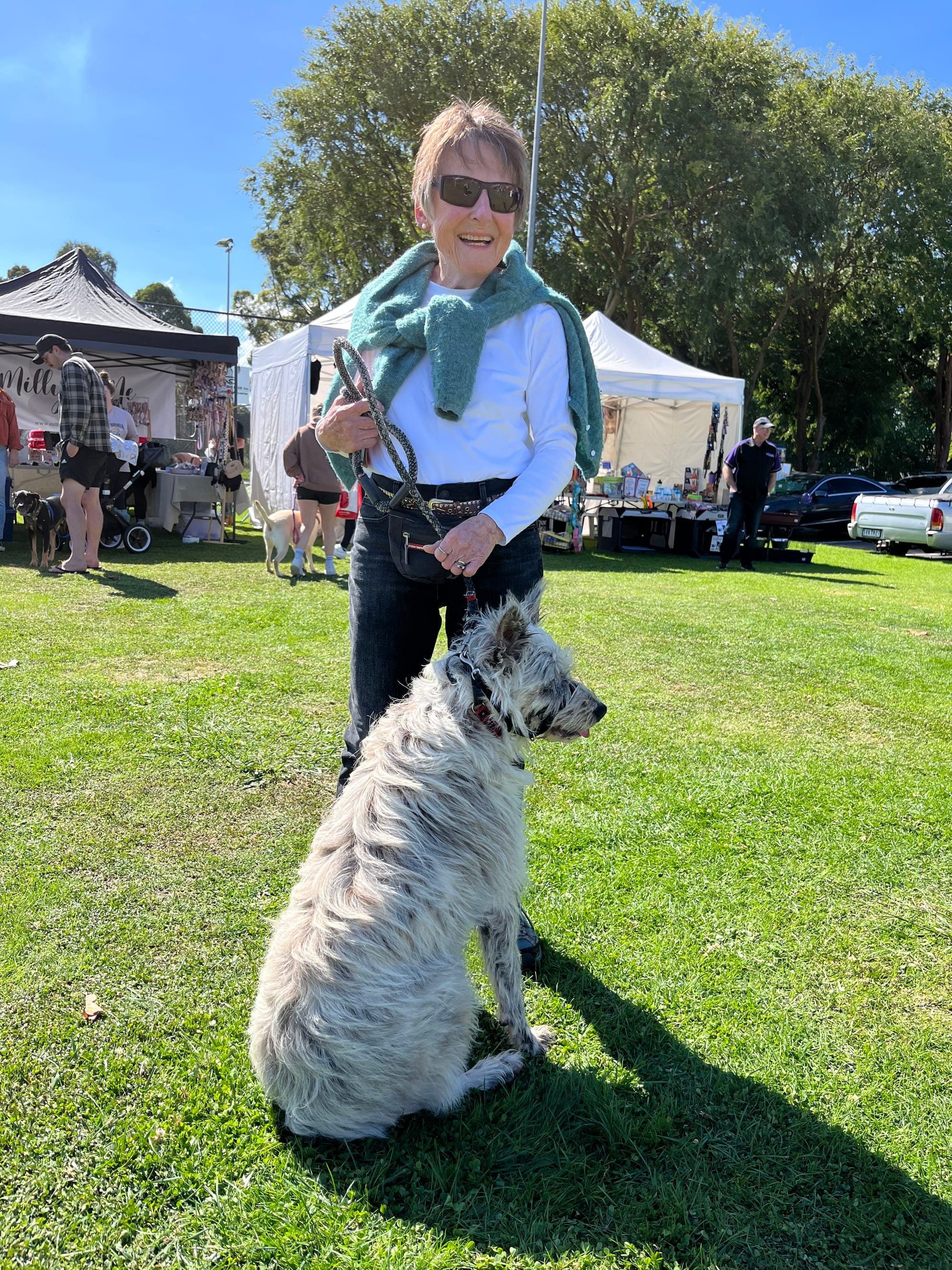Sue Sully takes her dog Meg on a walk around the expo.