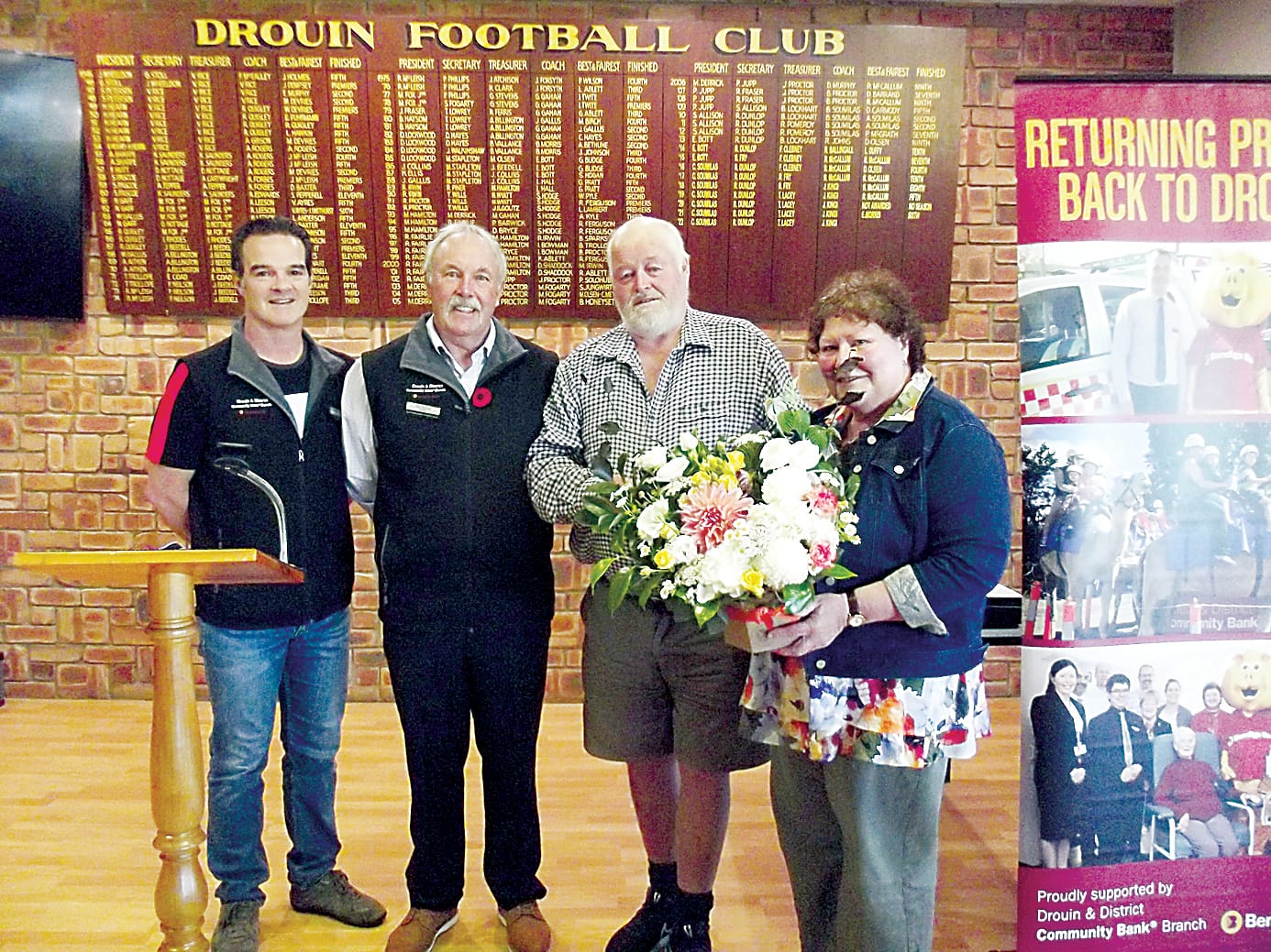 Above: Service to the board by Kim Rees (second from right) and his wife Jenny was recognised from vice-chair Matthew Williamson (left) and chair Rod Dunlop.Right: Warragul Camera Club's Bruce Langdon (left) and Russell Monson (right) with bank director Sean Walsh.