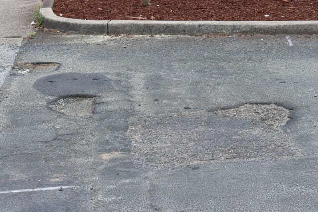 Pot Holes Woolies Carpark - 10.02.2022