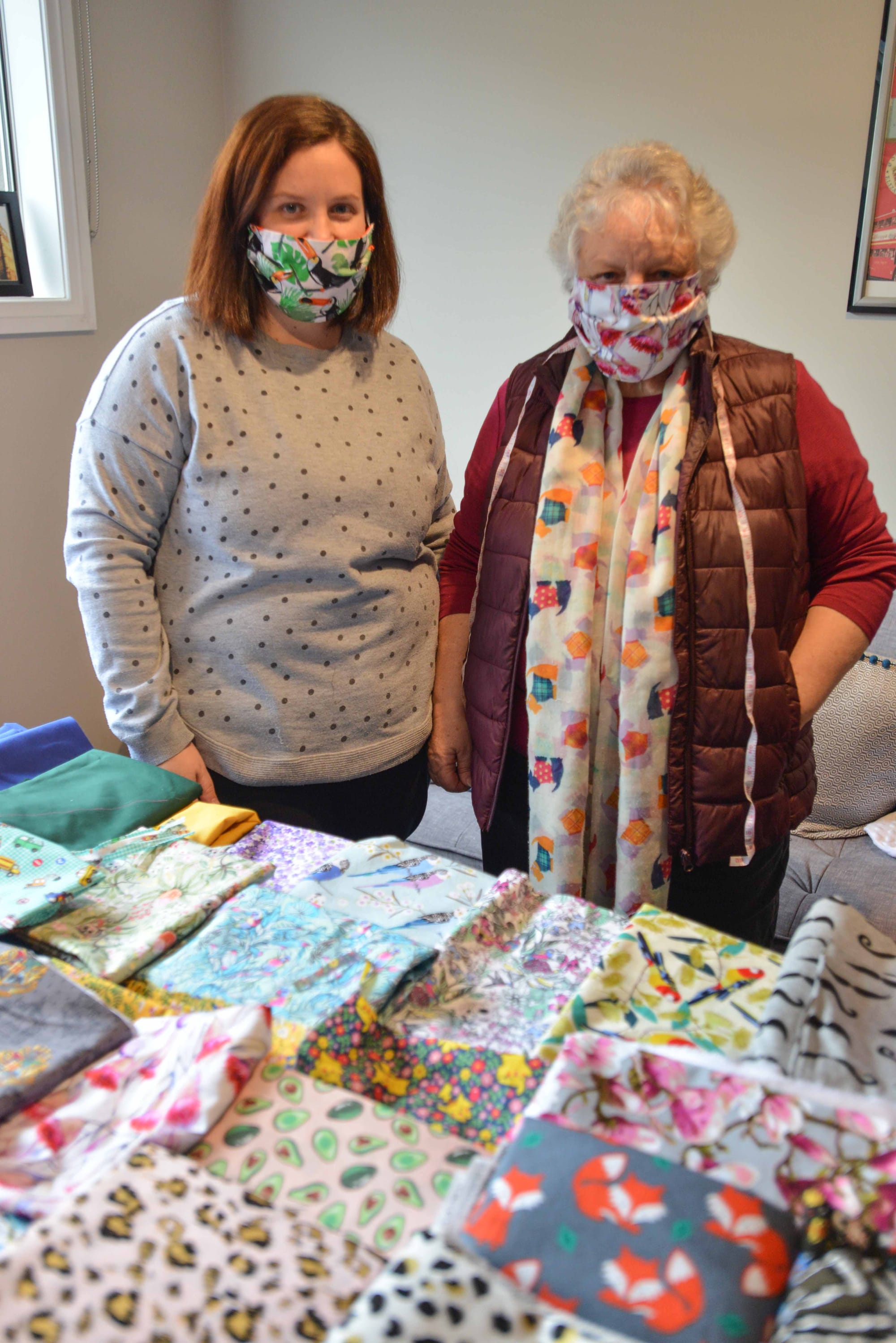 Mother-daughter team creating masks for sale